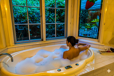AI has been used to add someone to the beautiful spa bath at Strawberry Patch. [5997]