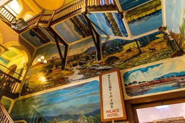 In 1980, indigenous artist Gordon Waye was paid to paint murals in the Palace Hotel. Most are landscapes. The murals were described as `tack-o-rama` in the movie `Priscilla, Queen of the Desert`. [3062]