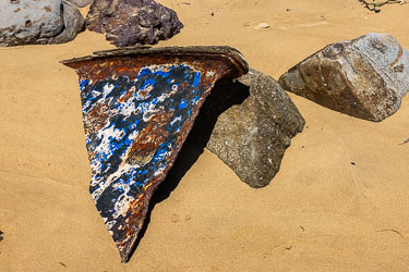 Unidentified rubbish on the beach, possibly a Delta Plate used for mooring navigation buoys in Port Hacking. Not expert identification though. [6445]
