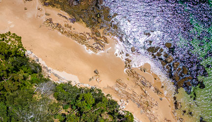 Looking straight down onto the beach at Bundeena, the noon-day sun highlights spectacular colours and patterns. [0156]