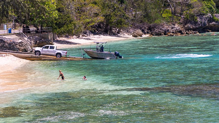 It's a rocky beach at Flying Fish Cove, but the water is fine. [9854]