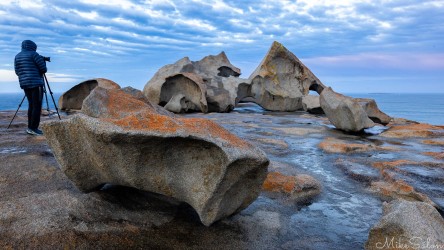 A photographer looking to take advantage of watery reflections at Remarkable Rocks. [4084]
