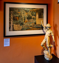 The statue of Huckleberry Finn has needed restoration after a long life in the garden. The hand-coloured photograph shows its location. What a great installation! [6170]