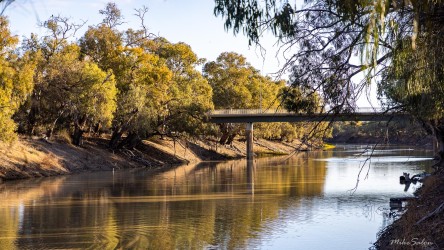 The Darling River, ever drab, is crossed at Menindee by this bridge, dated 1976. The first bridge here was constructed in 1927 replacing an 1862 punt nearby. [2246]