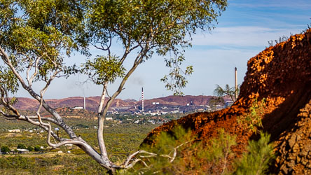 A glimpse of the city and Mt Isa Mines around the red earth of Telstra Hill. [7098]