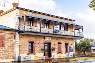 The 1881 Junction Hotel in Peterborough lost its roof to a fire on Christmas Day 1970, but this modest hotel is still going as far as we can see. [3192]