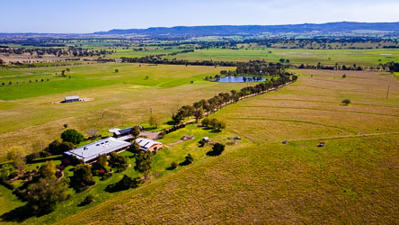 Aerial view of Strathearn Park Lodge in the Upper Hunter Valley showing its location a kilometer up the driveway from the New England Highway. [0095]