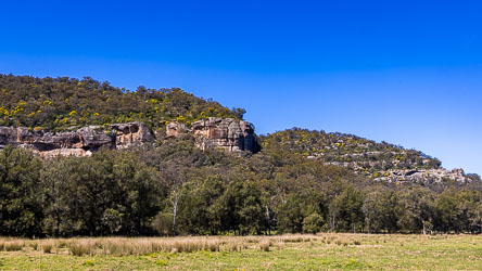 Characteristic landscape near Scone is this sandstone outcrop riddled with caves, cavities eroded away through the forces of weather. These caves shlter wildlife, and probably indigenous people in times past.. [5653]