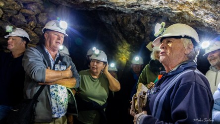 Visitors descend into the tunnels — guided by Kevin’s lamp and the stories of those who worked here. [2985]