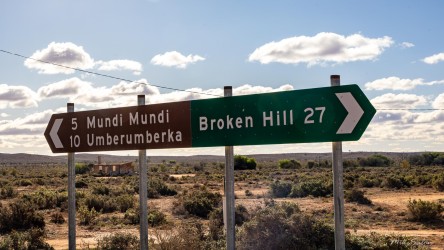 A crossroads of history — Broken Hill behind, Mundi Mundi ahead, and the open outback stretching forever. The Mundi Mundi Plains 
host the Mundi Mundi Bash, one of Australia’s most remote and spectacular music festivals set against vast desert horizons. [3037]