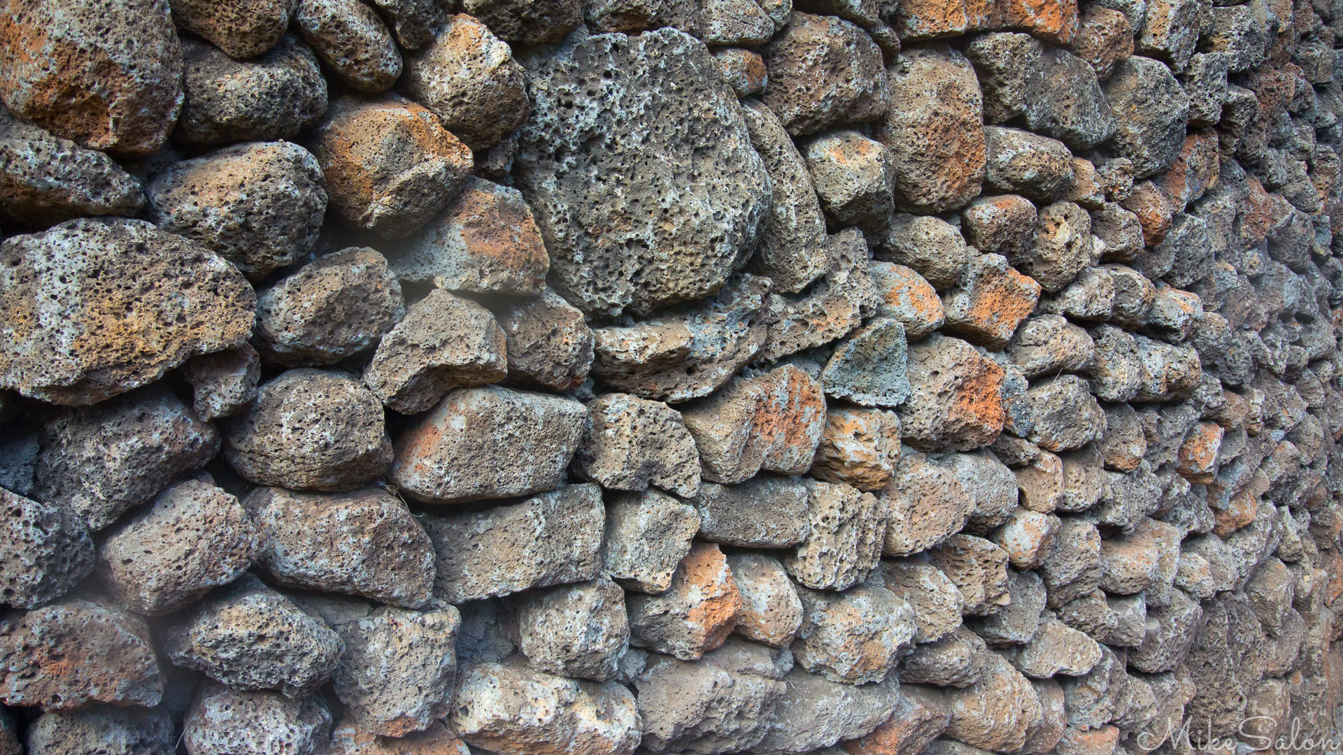 Stonewall : Seen on Chile's, Easter Island (Rapa Nui), a handsome wall built of volcanic rock fragments. [2104] (DSC_2104.jpg)<br>Camera: NIKON 1 AW1
